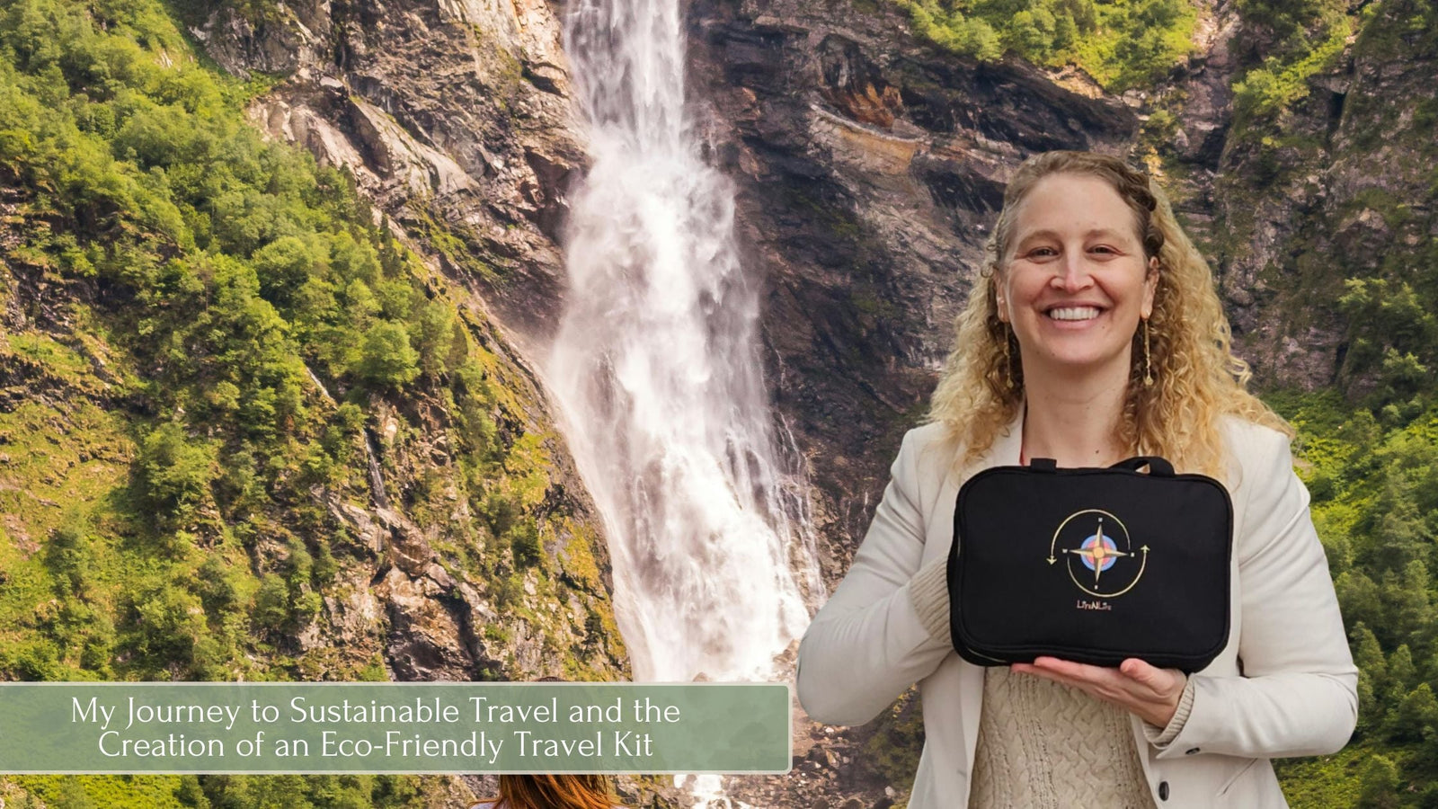 Woman standing in front of a waterfall holding a Lite n Life travel kit