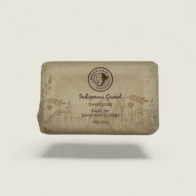 Bar of soap with a label on a beige background