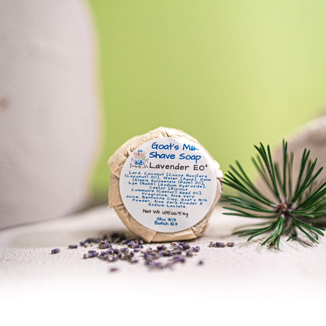 Goat's Milk Shave Soap with lavender on a white surface with green background
