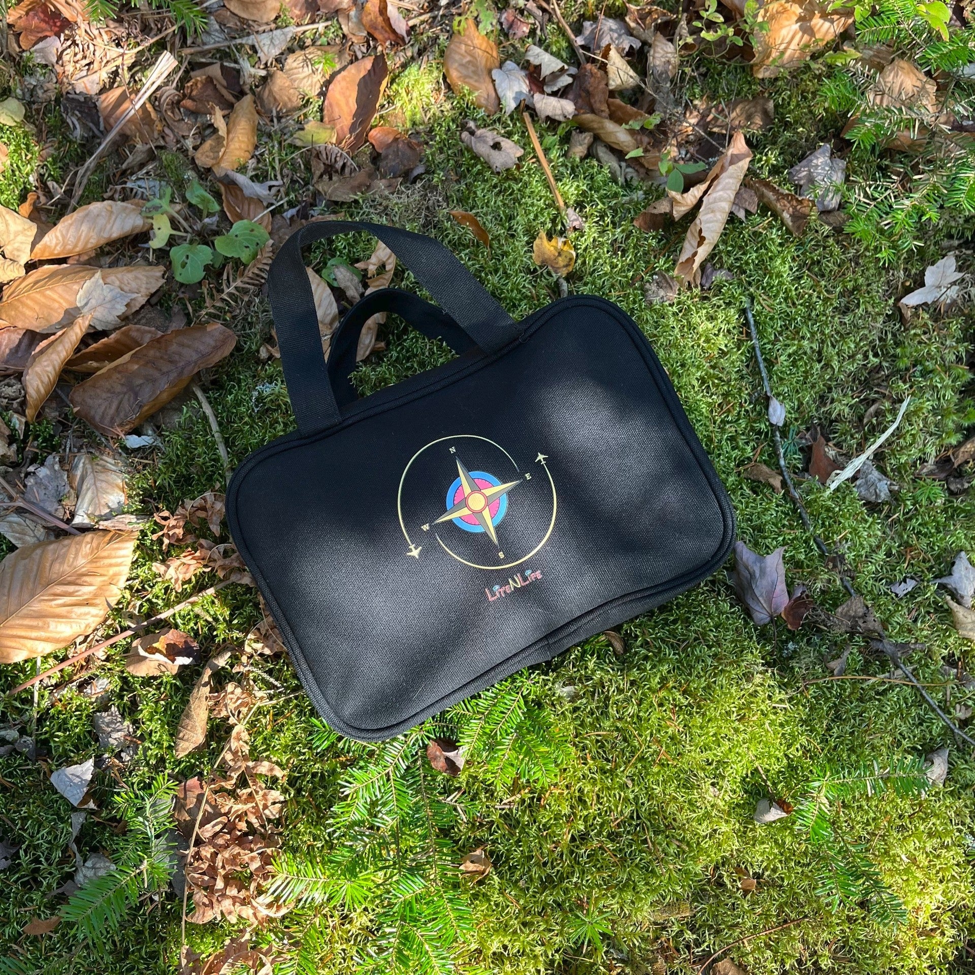 Lite n Life travel kit on a mossy ground with leaves