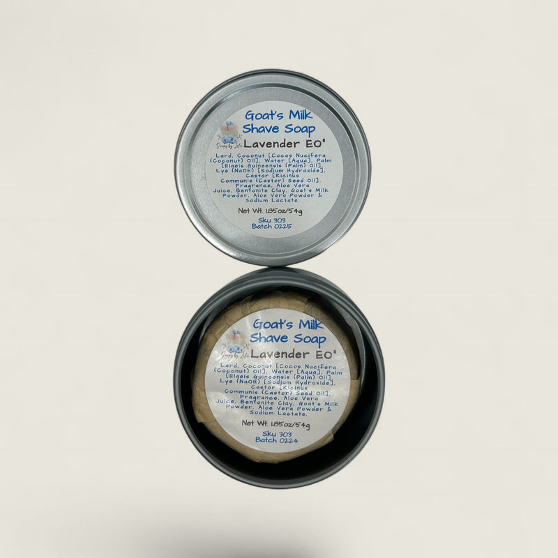Goat's Milk Shave Soap in a tin with a label on a light gray background